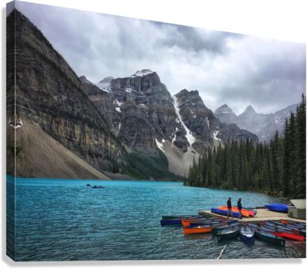 Moraine Lake Canoes Alberta  Canvas Print