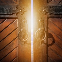 Magic light through open wooden door