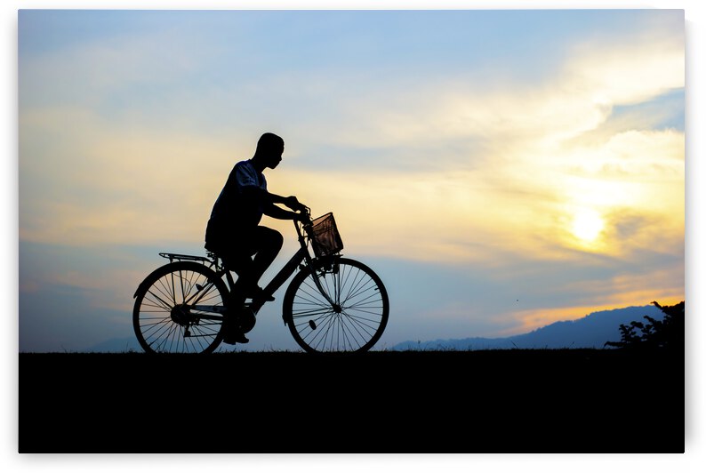 Children enjoy ride bicycle during sunset by JesseLeonard